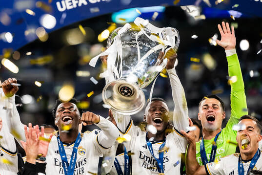 Eduardo Camavinga of Real Madrid lifts the trophy