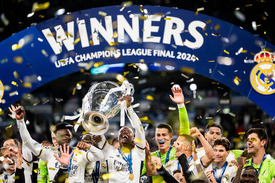 Eduardo Camavinga of Real Madrid lifts the trophy