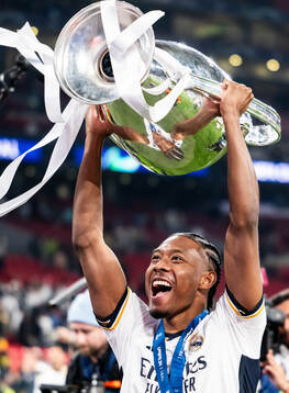 David Alaba of Real Madrid celebrates with the trophy