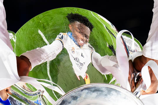 A reflection of Aurelien Tchouameni of Real Madrid is seen
