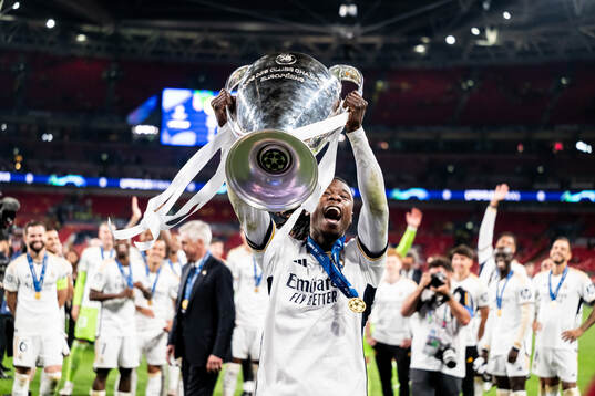 Eduardo Camavinga of Real Madrid celebrates with the trophy