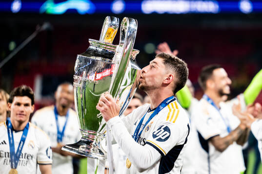 Federico Valverde of Real Madrid celebrates with the trophy