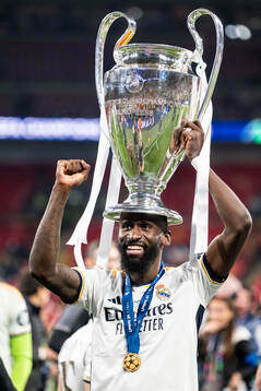 Antonio Rudiger of Real Madrid celebrates with the trophy