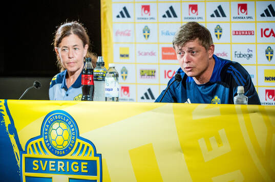 Media officer Petra Thorén and Head coach Jon Dahl