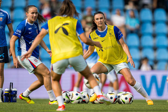 Ingrid Syrstad Engen of Norway warms up