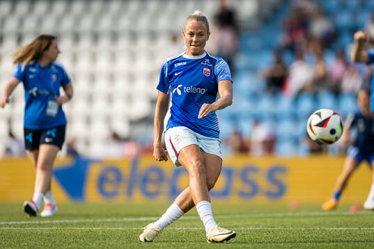 Guro Bergsvand of Norway warms up