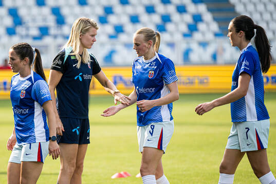Ada Stolsmo Hegerberg and Karina Sævik of Norway