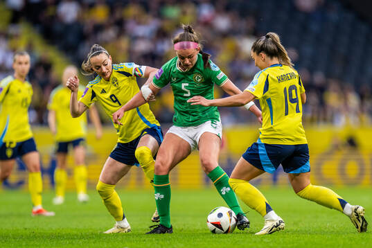 Kosovare Asllani and Johanna Rytting Kaneryd of Sweden