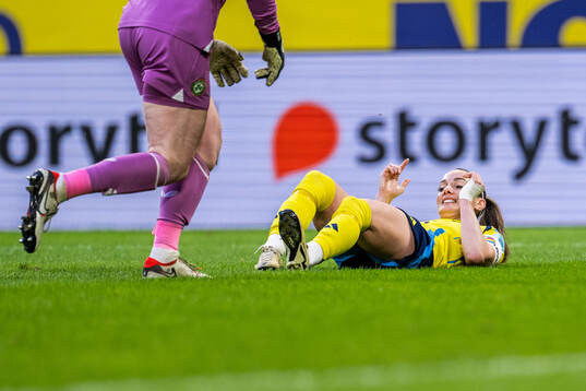 Kosovare Asllani of Sweden looks dejected