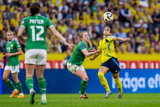 Megan Connolly of Republic of Ireland and Rosa Kafaji of