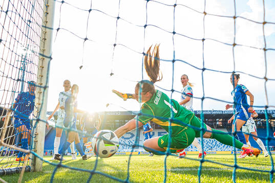 Frida Maanum of Norway scores the 1-1 goal