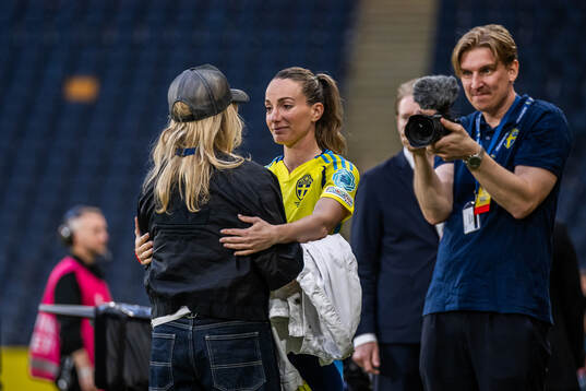 Team manager Marika Domanski Lyfors celebrates with