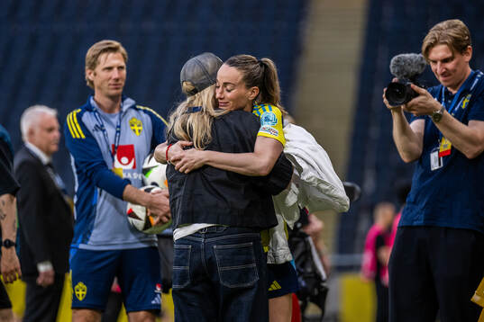 Team manager Marika Domanski Lyfors celebrates with