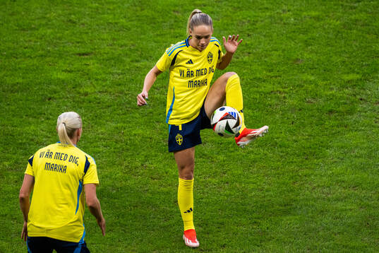Jonna Andersson and Hanna Lundkvist of Sweden with a warm
