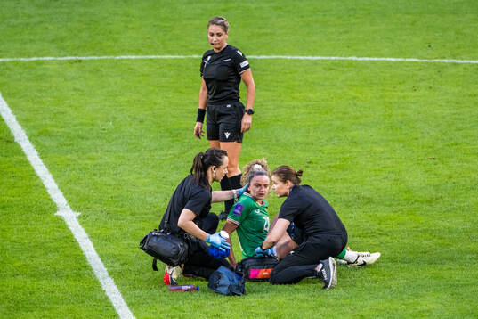 Leanne Kiernan of Republic of Ireland receives medical