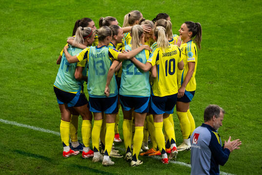 Magdalena Eriksson of Sweden celebrates with team mates
