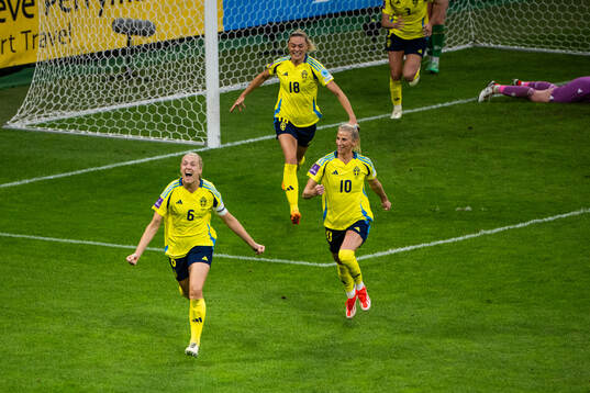 Magdalena Eriksson and Sofia Jakobsson of Sweden celebrate