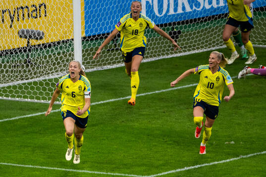 Magdalena Eriksson and Sofia Jakobsson of Sweden celebrate