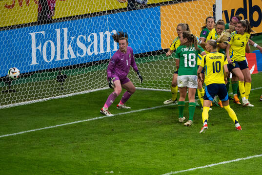 Magdalena Eriksson of Sweden scores 1-0 behind goalkeeper
