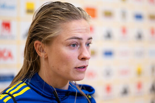Fridolina Rolfö of Sweden in mixed zone