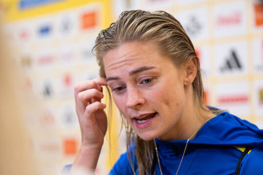 Fridolina Rolfö of Sweden in mixed zone