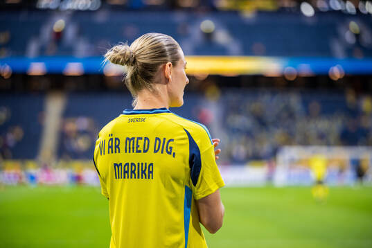 Emma Kullberg of Sweden, with a shirt dedicated to team