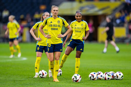 Fridolina Rolfö of Sweden, with a shirt dedicated to team