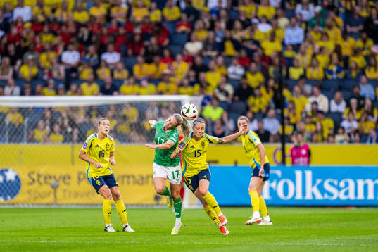 Lily Agg of Republic of Ireland and Julia Zigotti Olme of
