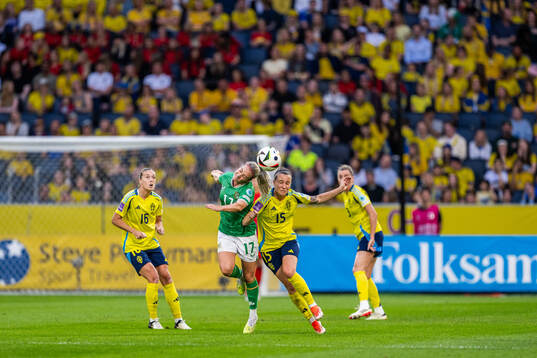 Lily Agg of Republic of Ireland and Julia Zigotti Olme of