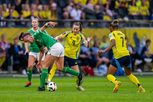 Caitlin Hayes of Republic of Ireland and Kosovare Asllani