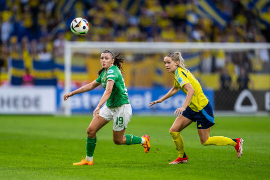 Abbie Larkin of Republic of Ireland and Hanna Lundkvist of