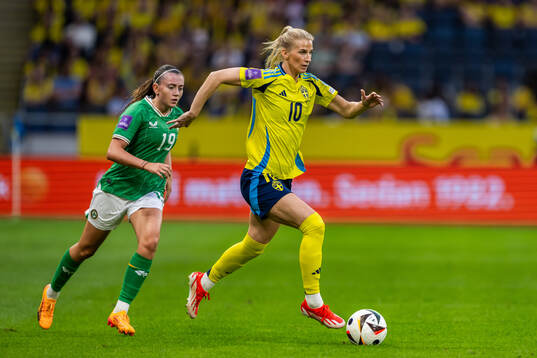 Abbie Larkin of Republic of Ireland and Sofia Jakobsson of