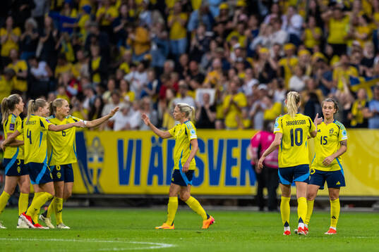 Sofia Jakobsson and Julia Zigotti Olme of Sweden celebrate