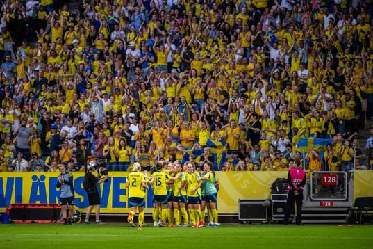 Magdalena Eriksson of Sweden celebrates with team mates