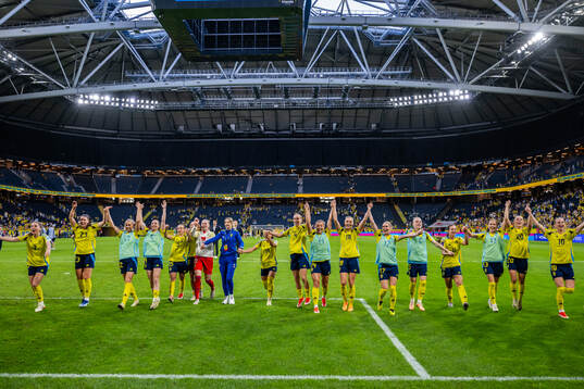 Players of Sweden celebrate