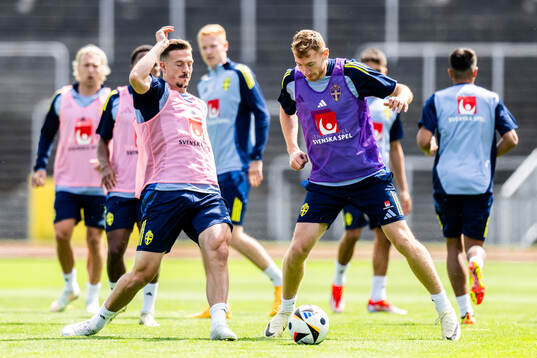 Simon Olsson and Dejan Kulusevski of the Swedish men's