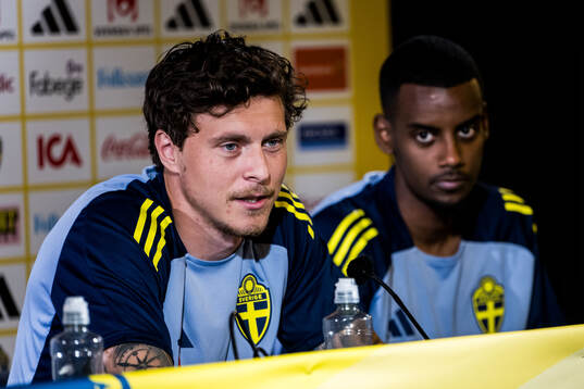 Victor Nilsson Lindelöf and Alexander Isak of Sweden of