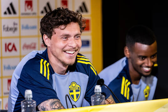 Victor Nilsson Lindelöf and Alexander Isak of the Swedish