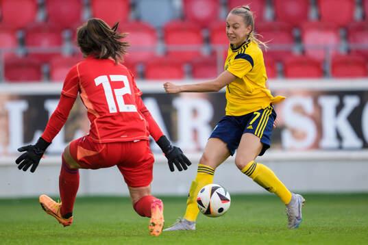 Goalkeeper Lina von Schrader of Germany and Sara Eriksson