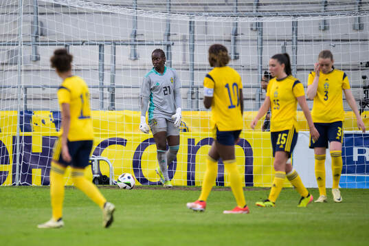 Goalkeeper Angel Mukasa of Sweden looks dejected