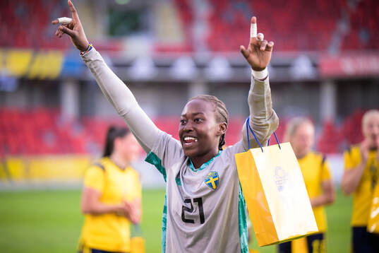 Goalkeeper Angel Mukasa of Sweden celebrates