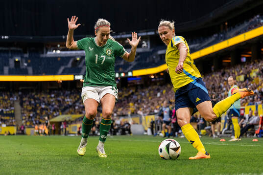 Lily Agg of Republic of Ireland and Jonna Andersson of