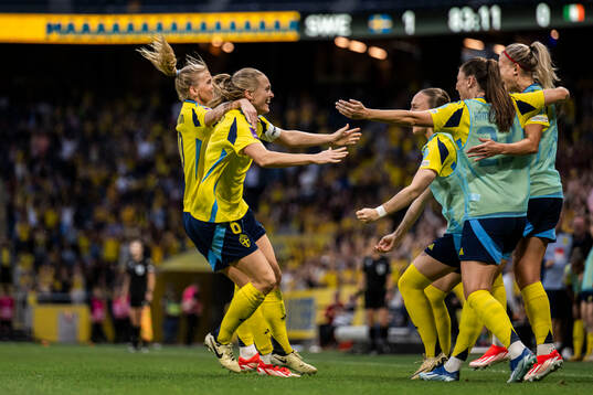 Sofia Jakobsson and Magdalena Eriksson of Sweden celebrate