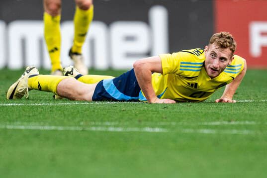 Dejan Kulusevski of Sweden looks dejected