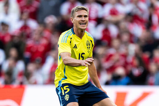 Carl Starfelt of Sweden looks dejected