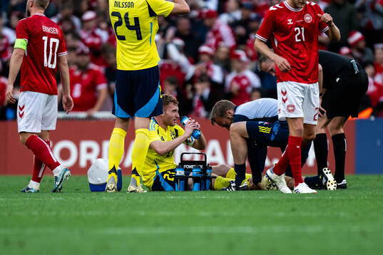 Dejan Kulusevski of Sweden in pain