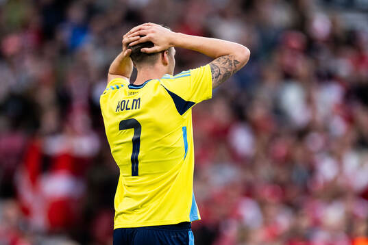 Emil Holm of Sweden looks dejected