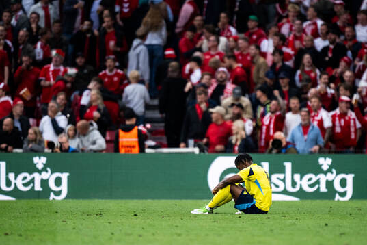 Anthony Elanga of Sweden looks dejected