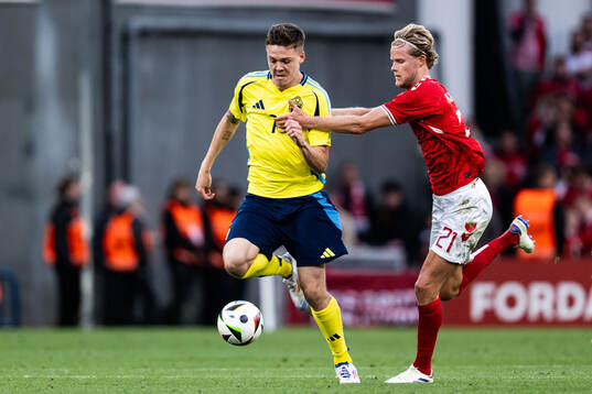 Emil Holm of Sweden and Morten Hjulmand of Denmark