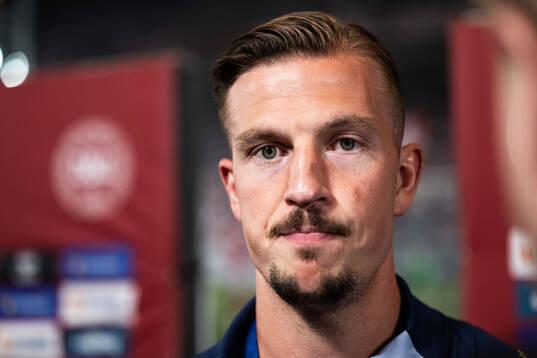 Simon Olsson of Sweden in mixed zone